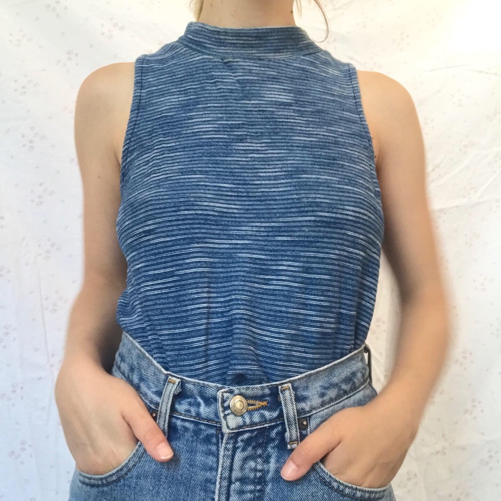 Blue mock neck sleeveless top